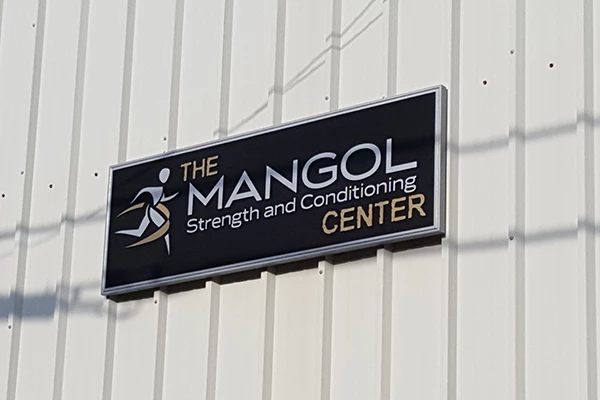 Sand blasted sign at Mangol and Conditioning Center